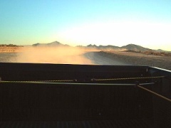 Not only was I going like 40mph, I figured, "what the hell", and stuck my head and camera out the back window for a pic of the mile-long dust trail.