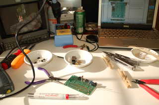 20090428 - I can has voltage regulation!  C41 clips are poor replacements for a real vise, and even after adding additional 6 ounces of weight to base of soldering iron, iron is uncomfortably wobbly when jammed back.  Also, iron or solder is really... Rosin-ie.  Lots of the orange goo, probably got myself cruddy stuff from Frys crapbin.  OMG SO FUN THOUGH.